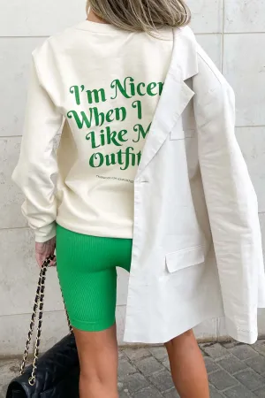 i like my outfit green printed cream sweater